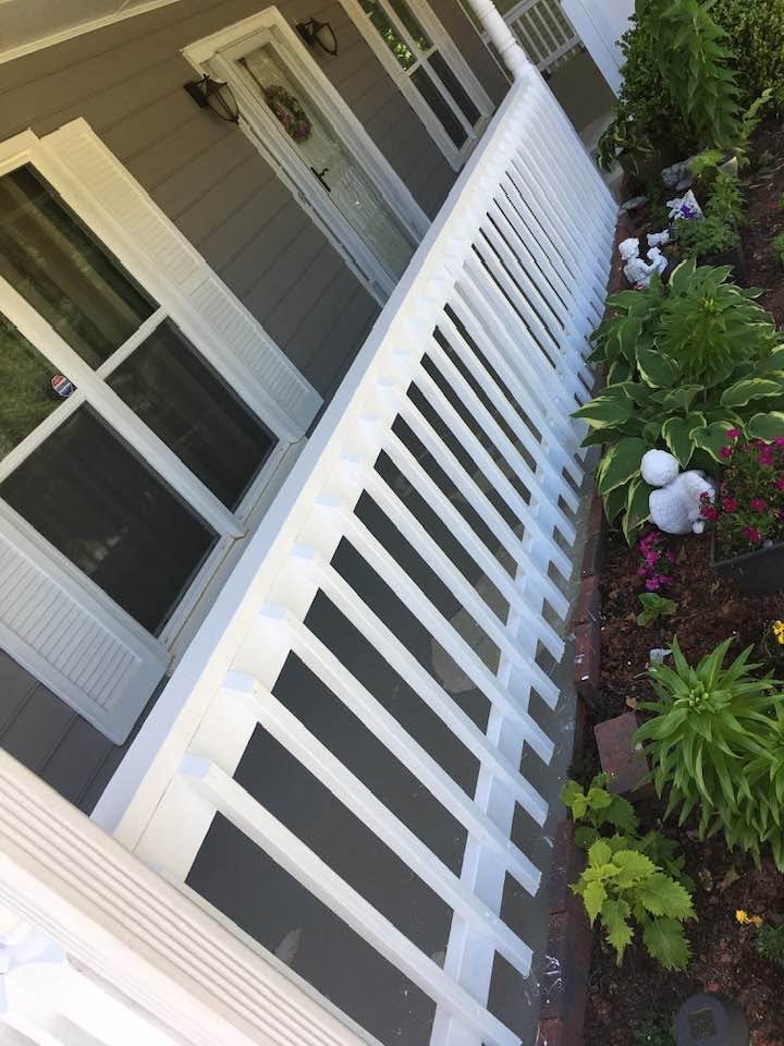 Completed front porch with new white wood railing installed — Metro Atlanta, GA