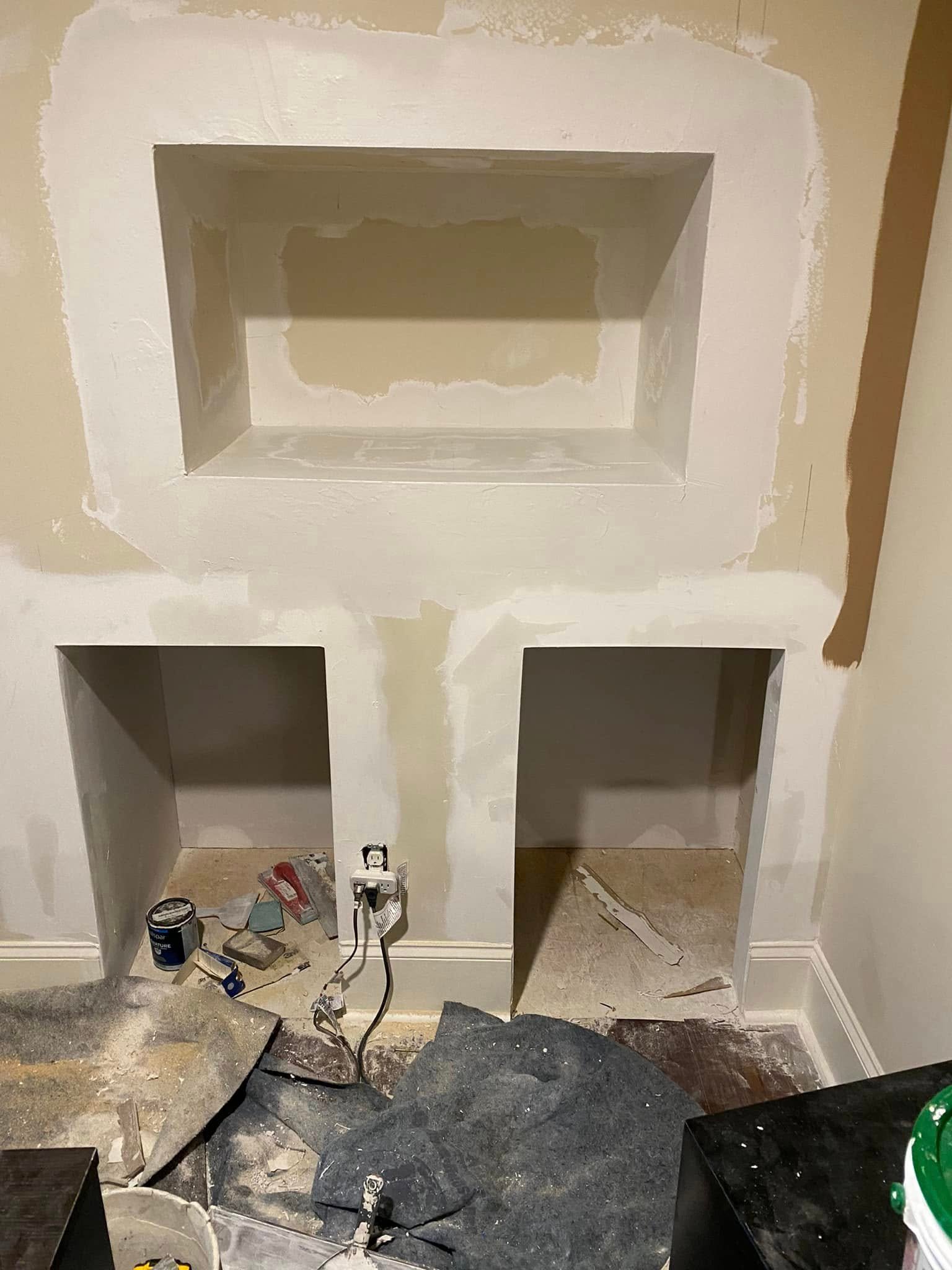 Custom drywall niches freshly mudded and taped mid-construction — Metro Atlanta, GA